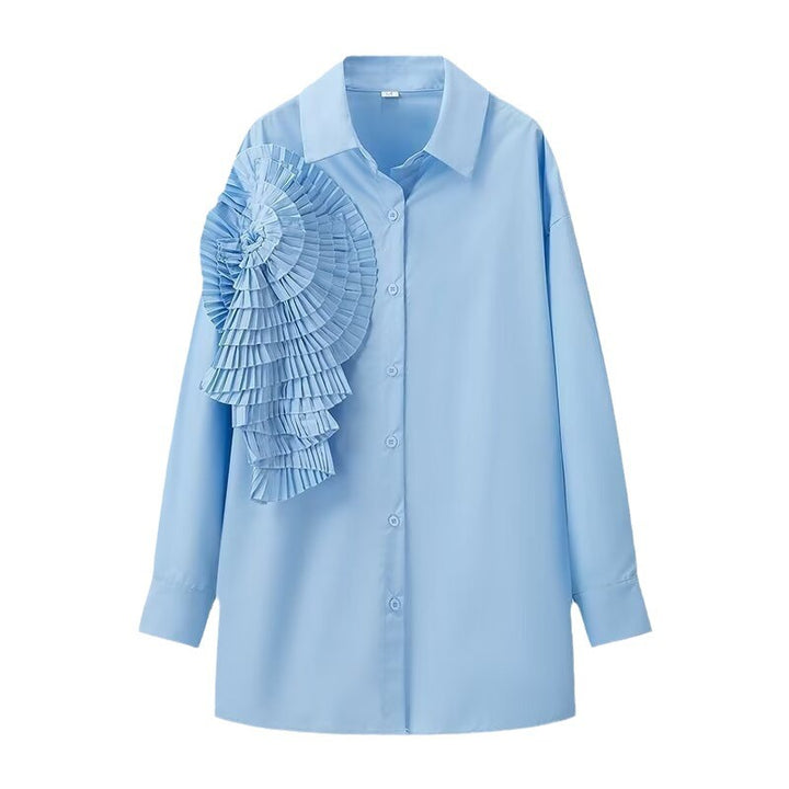 Damebluse med asymmetrisk flæse-design og elegant knaplukning Stilla
