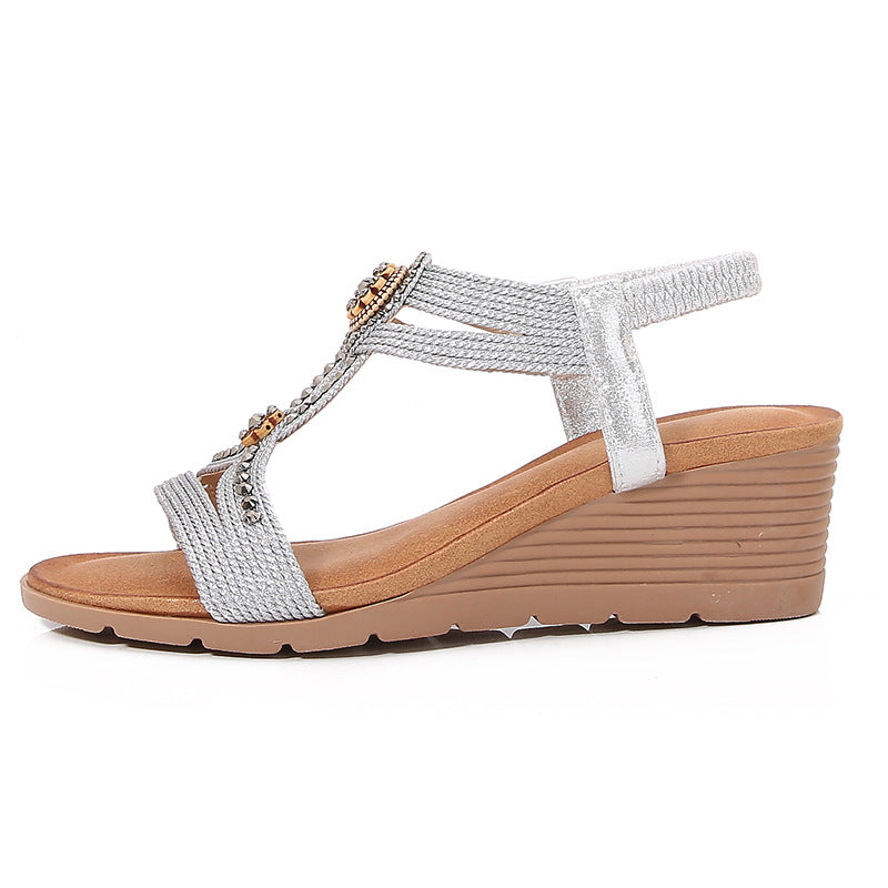 Dame sandaler med kilehæle og elegante udsmykninger Stilla