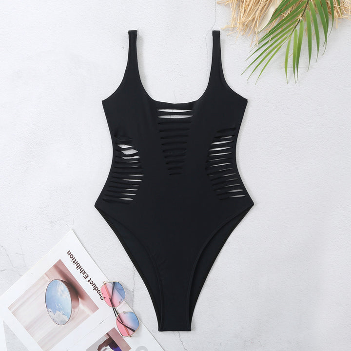 Dame én-delt badedragt med raffinerede cut-out-detaljer Stilla