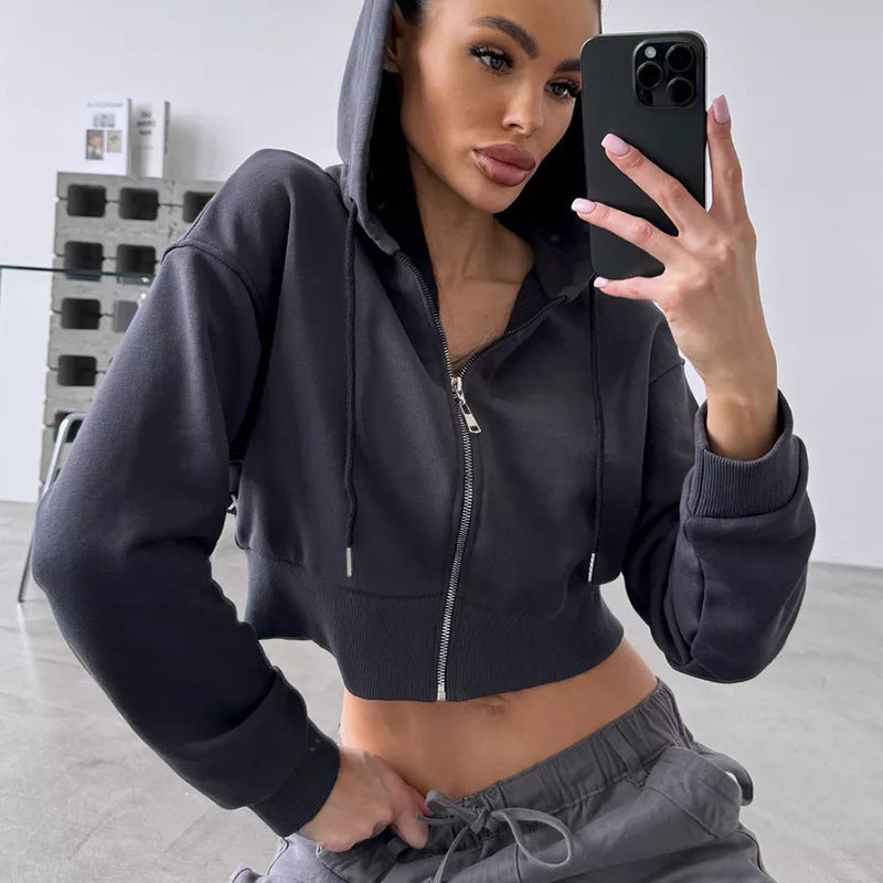 Kvinders cropped hoodie med lynlås og sidelommer Skovae