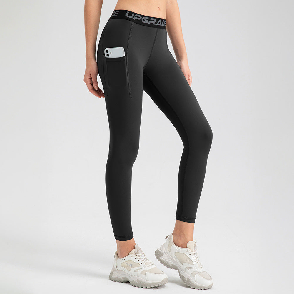 Dame Sporty High-Waist Leggings med praktiske sidelommer og fleksibel pasform Stilla