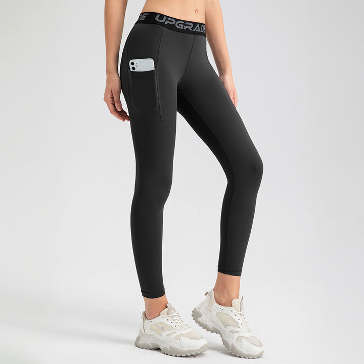 Dame Sporty High-Waist Leggings med praktiske sidelommer og fleksibel pasform Stilla