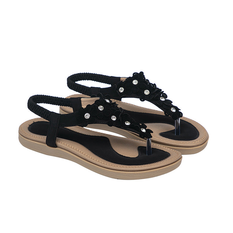 Dame sandaler med blomstret design og glitrende detaljer Stilla