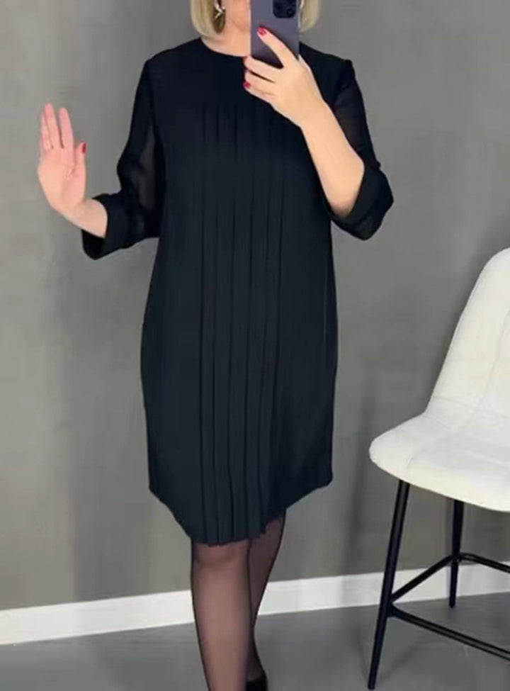 Dame Plisse aften kjole med gennemsigtige ærmer og elegant snit Stilla