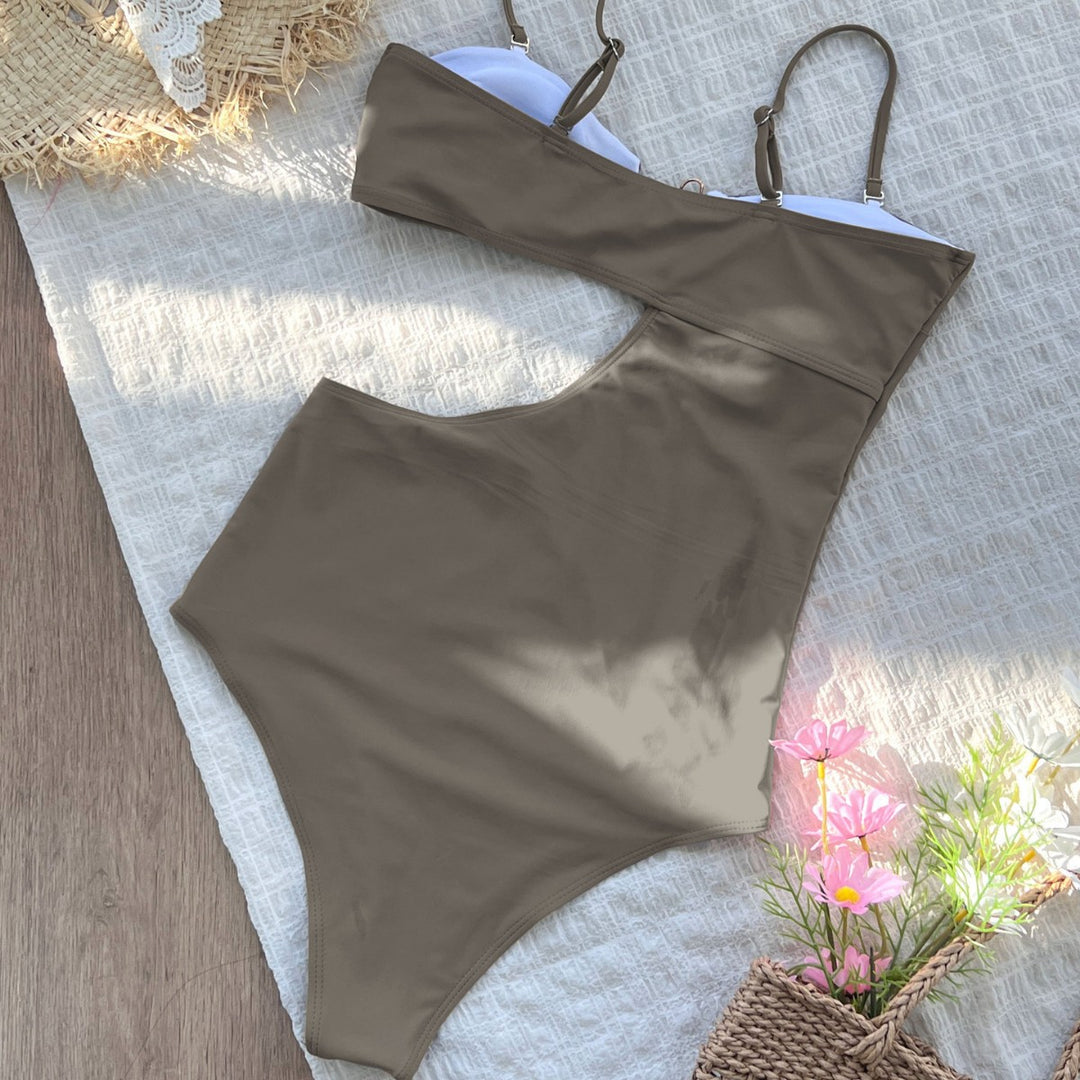 Dame badedragt med asymmetrisk cut-out og stilfuld ringdetalje Stilla