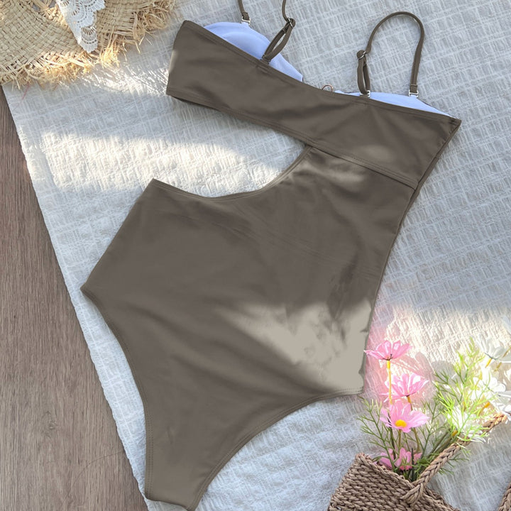 Dame badedragt med asymmetrisk cut-out og stilfuld ringdetalje Stilla