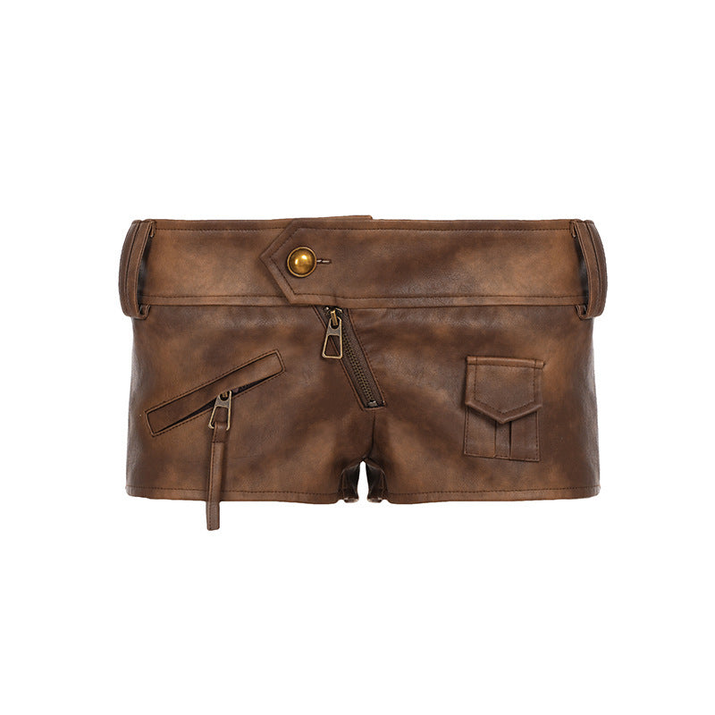 Dame Modische Shorts aus Kunstleder mit praktischen Taschen und dekorativen Reißverschlüssen Skovae