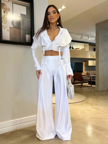 Dameensemble med figursyet crop-top og elegant højhvidt bukser Stilla