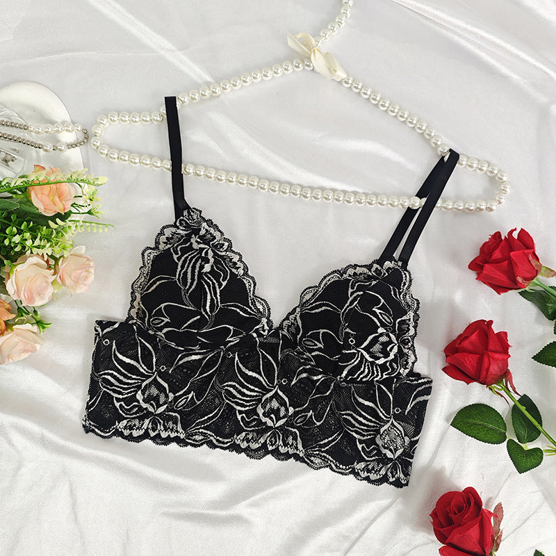 Dame Spids-Bustier i floralt design med transparente indsatser og justerbare stropper Stilla