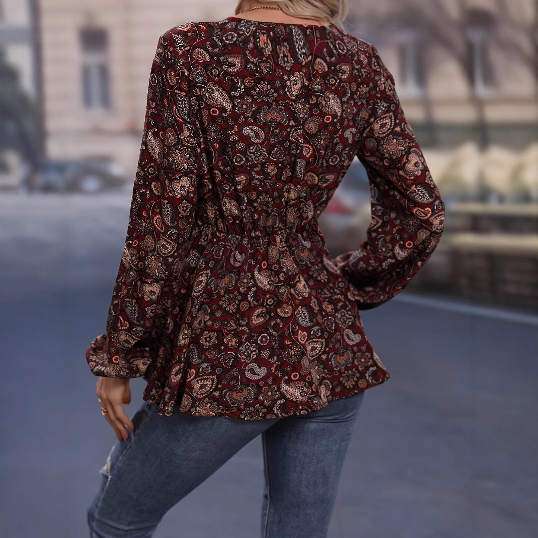 Dame vikkel bluse med blomstret design og elastisk talje Stilla