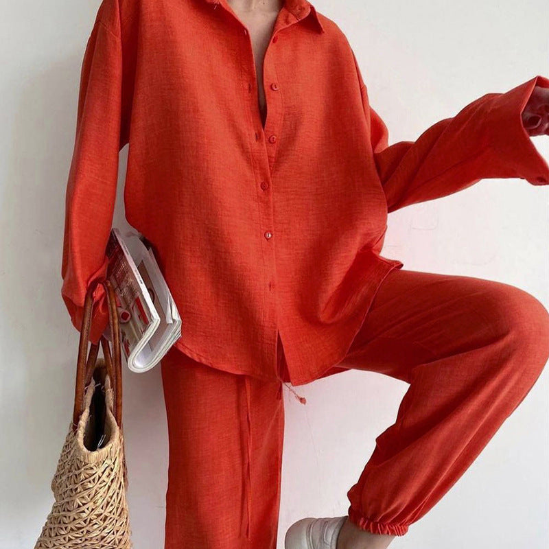 Dame Casual Linnekostume med løs pasform og elegant knaplukning Stilla