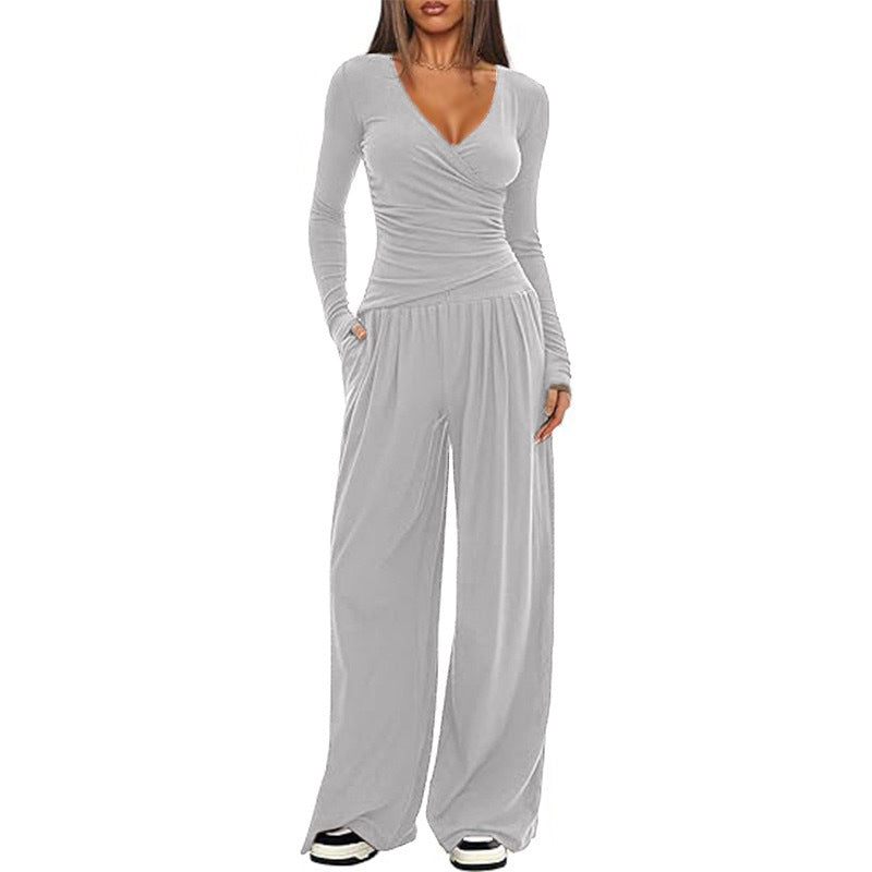 Dame afslappet jumpsuit med omslagsdesign og bredt ben Skovae