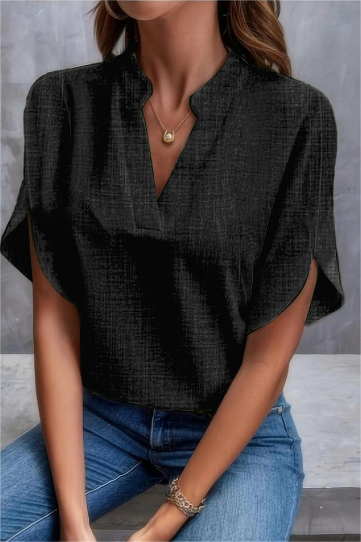 Dame elegant kortærmet bluse med moderne ståkrave og casual sideslidser Stilla
