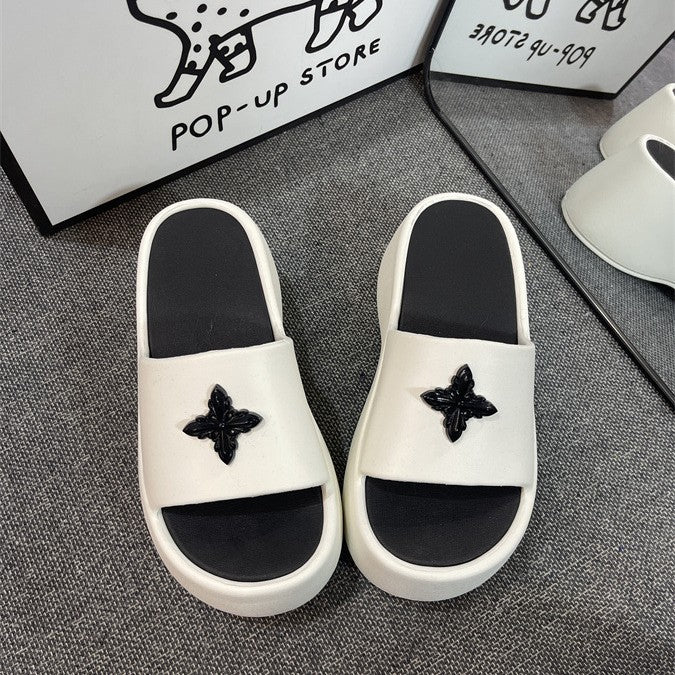 Dame komfortable og stilfulde slip-ons med elegant blomster-applikation Stilla