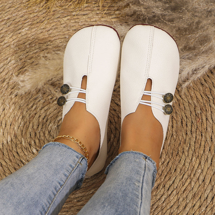 Dame Slip-On sko med moderigtigt knapdetalje og blødt overmateriale Stilla