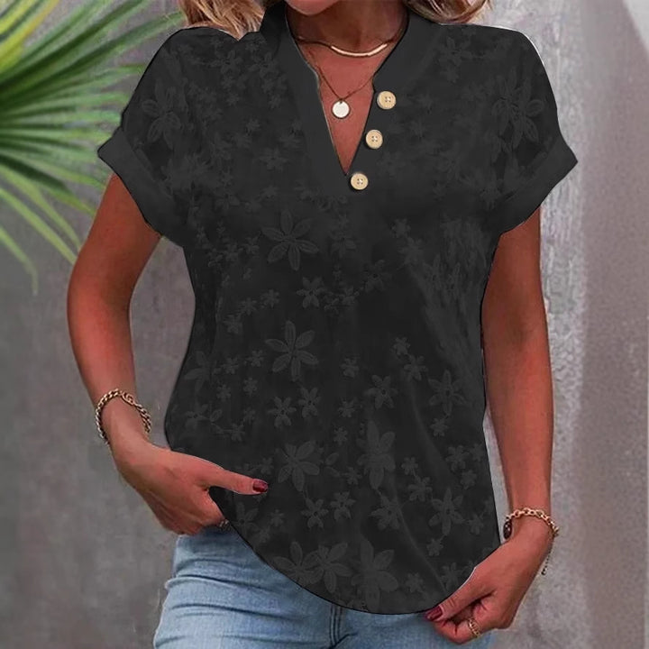 Damer elegant bluse med blomsterdesign og knapdetaljer Stilla