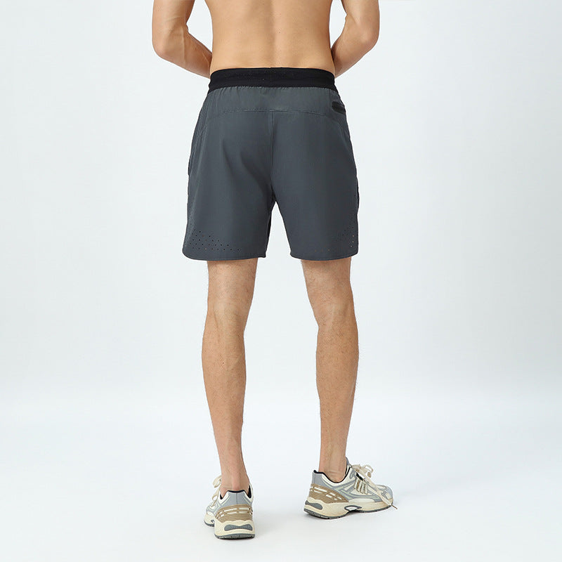 Herre åndbare sportshorts med elastisk linning og hurtigttørrende materiale Stilla