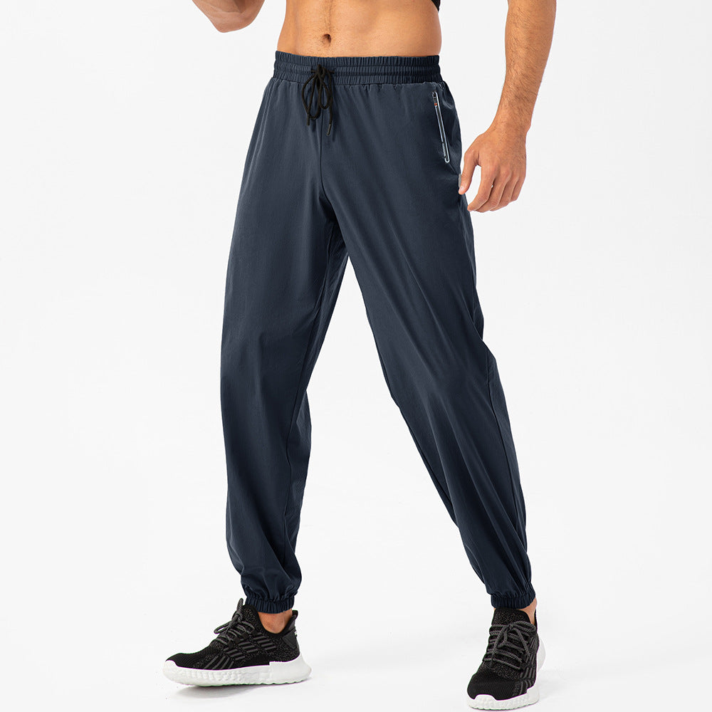Herrer Sporty Joggingbukser med elastisk taljebånd og praktiske lynlåslommer Stilla