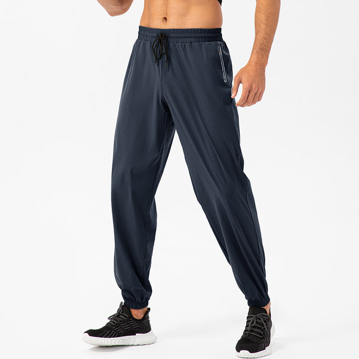 Herrer Sporty Joggingbukser med elastisk taljebånd og praktiske lynlåslommer Stilla