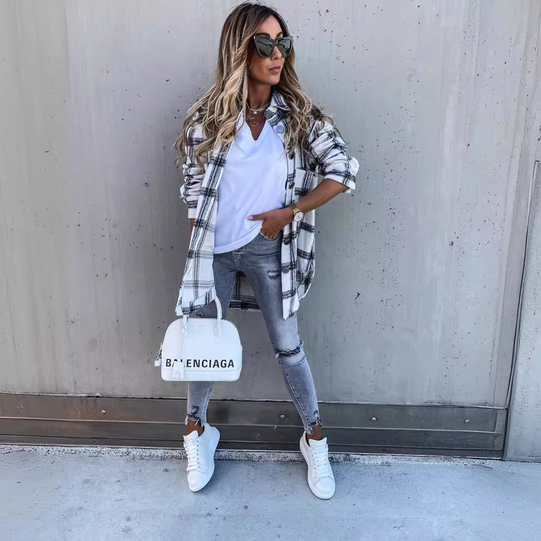 Dame afslappet ternet bluse i oversized snit med knapdetaljer Stilla