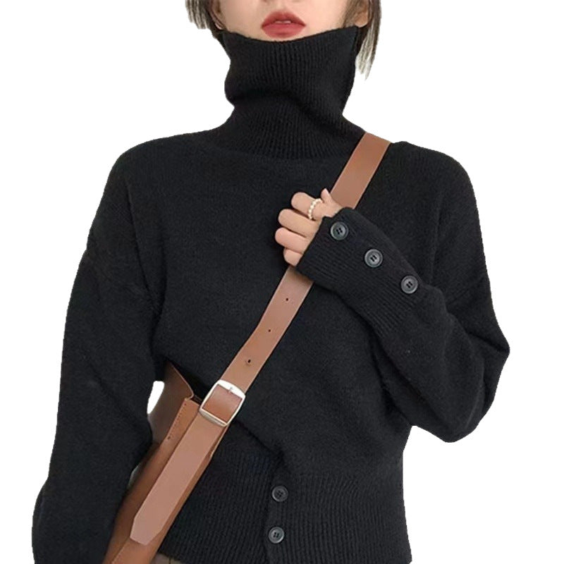 Kvinders rullekrave sweater med knapdetaljer og blødt materiale Stilla
