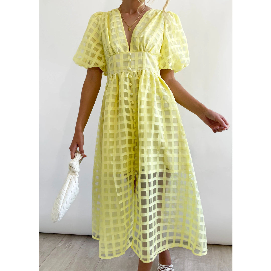 Dame midi kjole med spændende ternet design Stiila