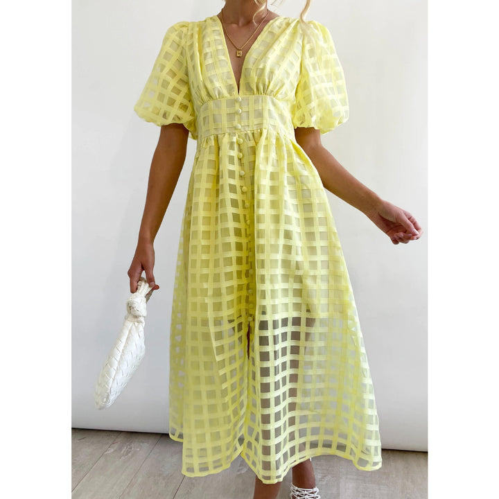 Dame midi kjole med spændende ternet design Stiila
