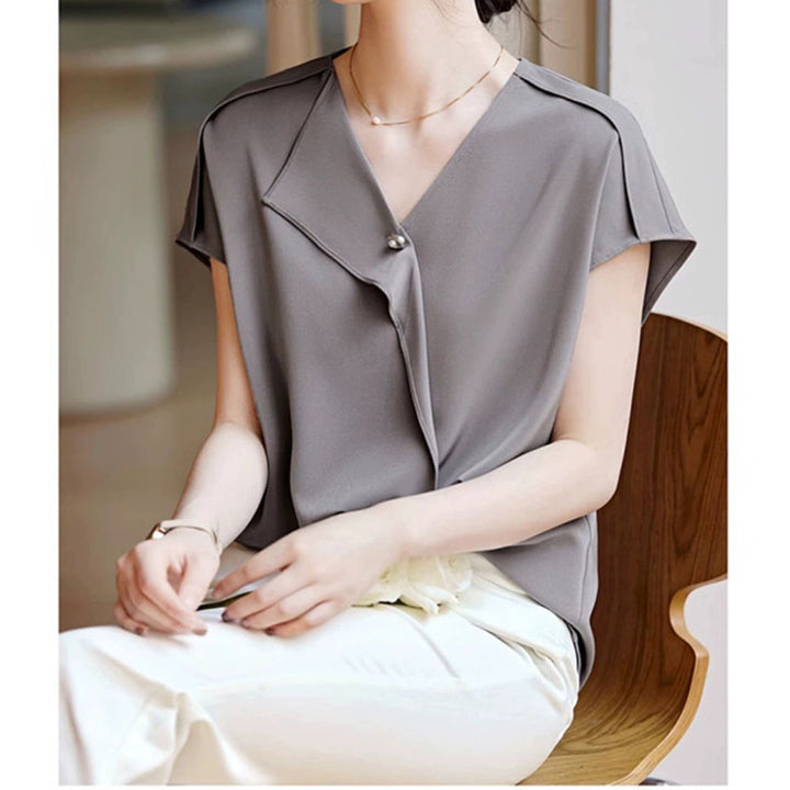 Damebluse med elegant viklook Stilla