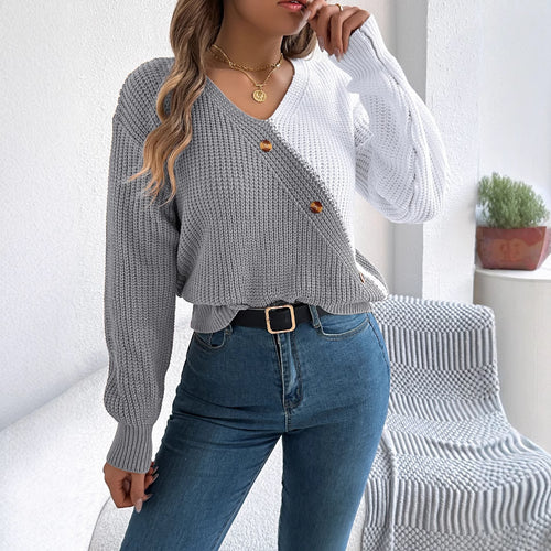 Dame strikpullover med moderne farveblokke og knapdetaljer Stilla
