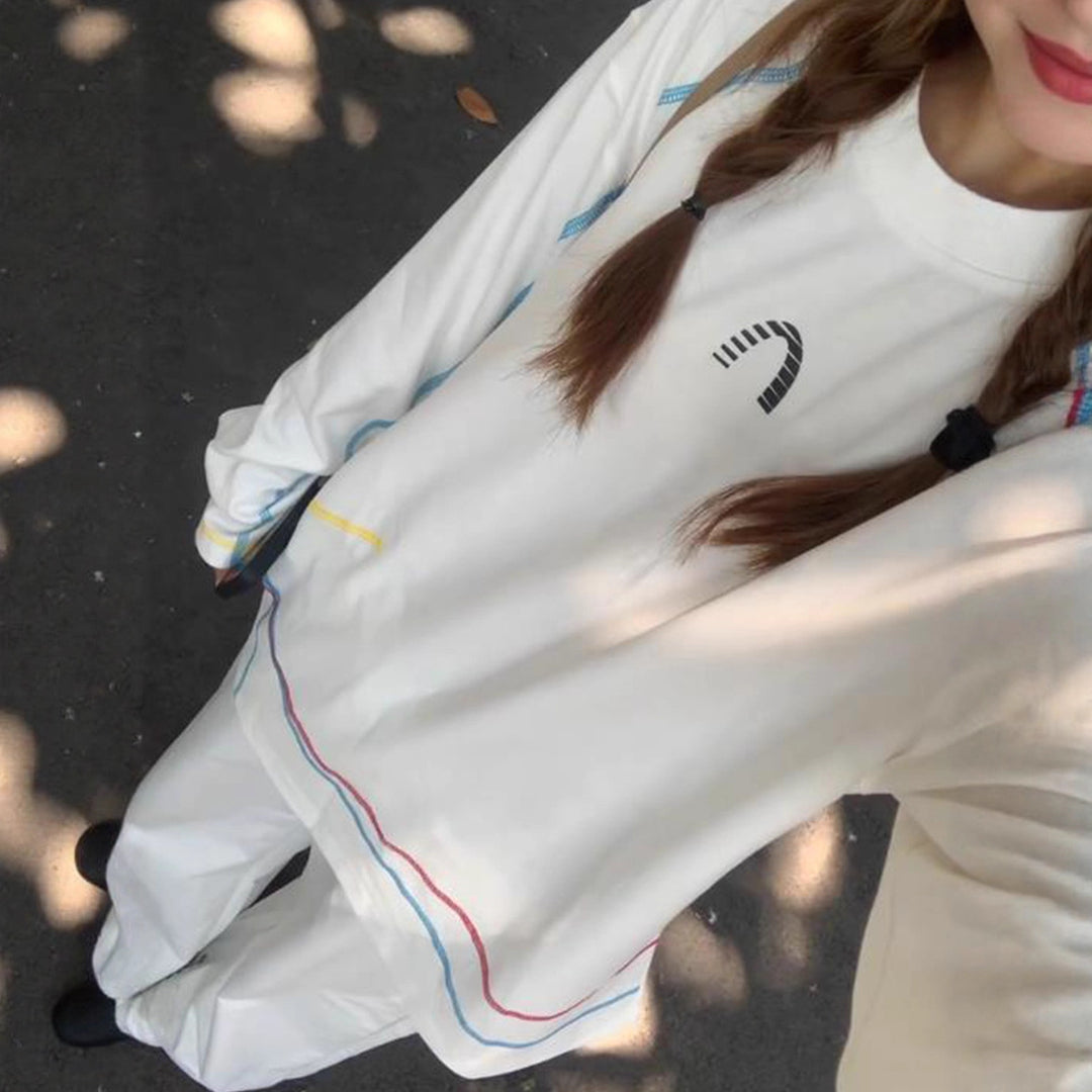 Kvinders afslappede oversized sweatshirts med farverige accentstriber Stilla