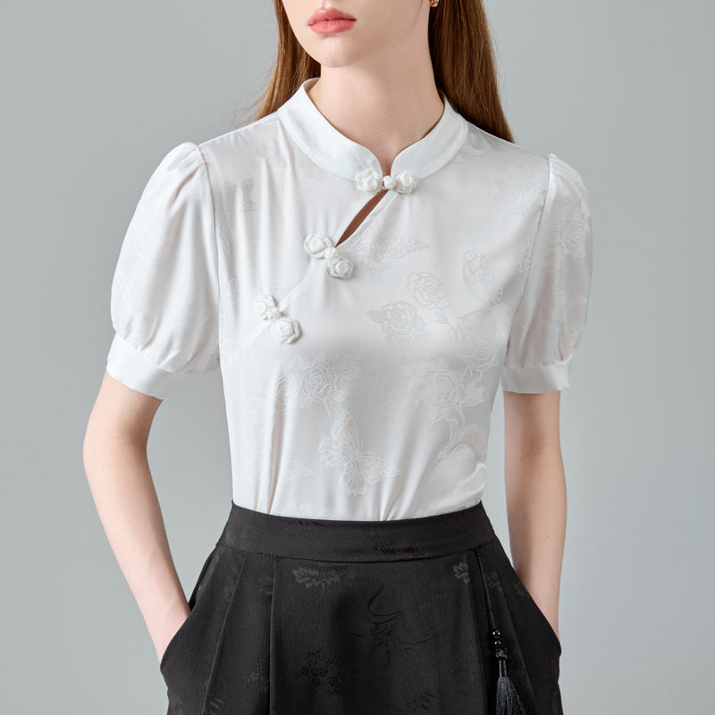 Damebluse med puffærmer og dekorative knapper Stilla