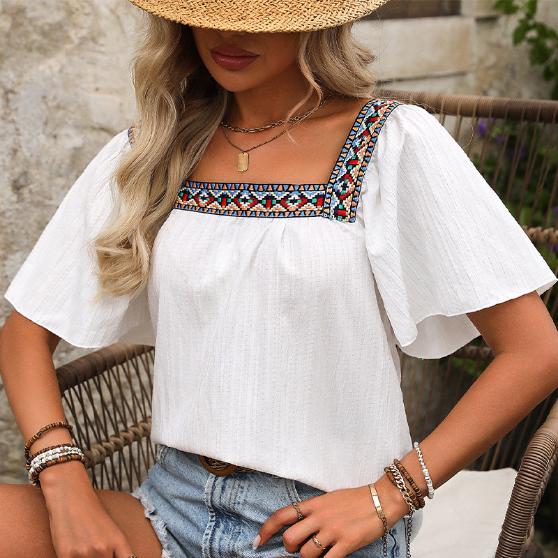 Dame luftig bluse med elegant ramme og farverigt detalje Stilla