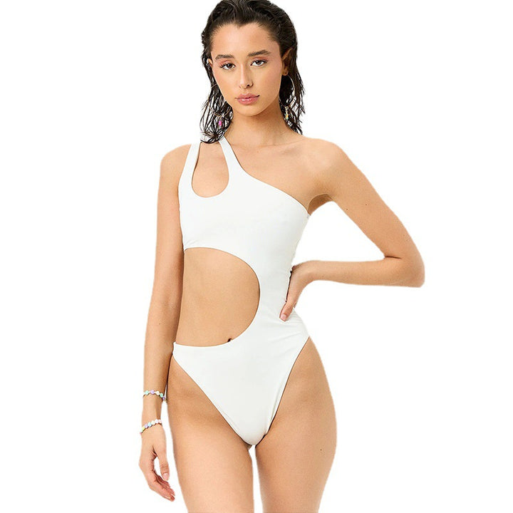 Dame Én-delt badedragt med asymmetrisk cut-out-design og høj benudskæring Stilla