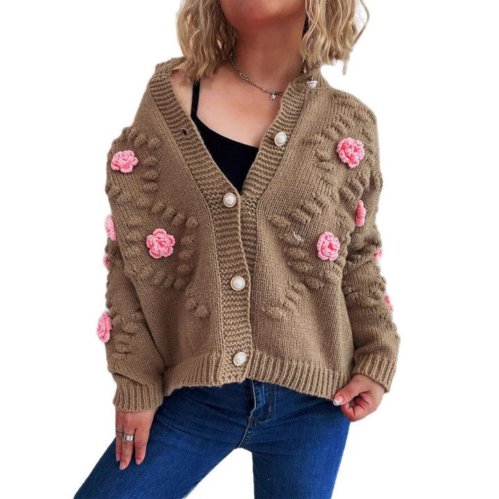 Dame cardigan med blomsterapplikationer og perleknapper Stilla