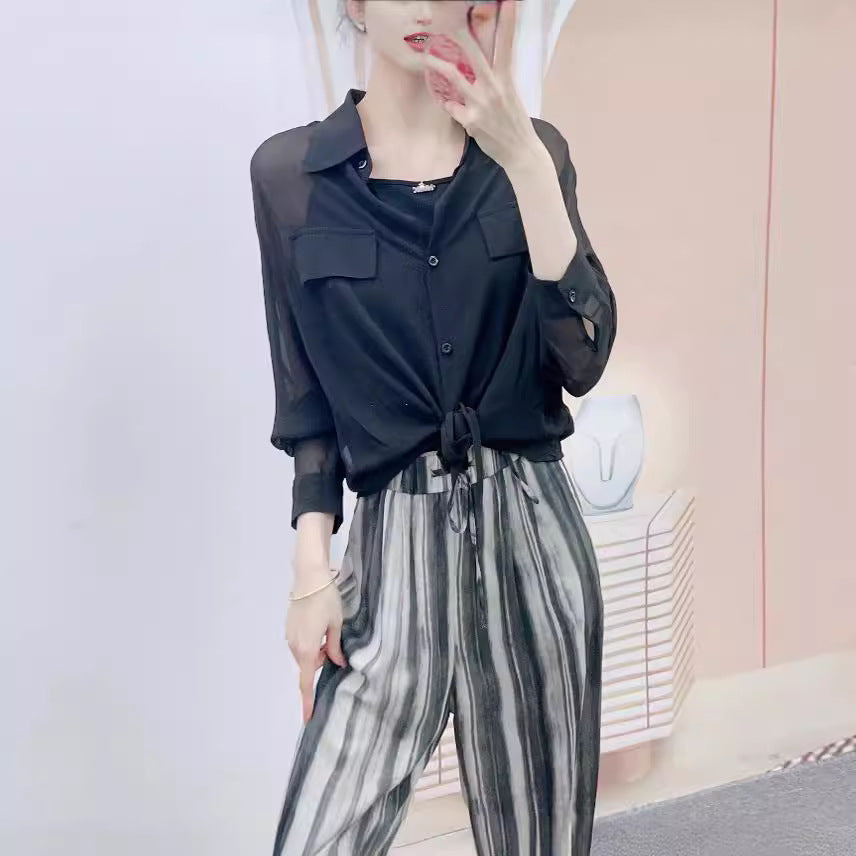 Damer Legesyg Chiffonbluse med gennemsigtige ærmer og elegant indpakningslook Stilla