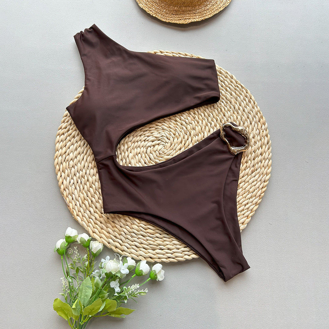 Dame onepiece bikini med asymmetrisk snit og dekorativ ring Stilla