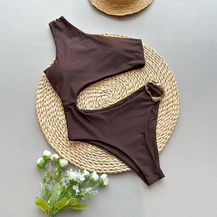 Dame onepiece bikini med asymmetrisk snit og dekorativ ring Stilla
