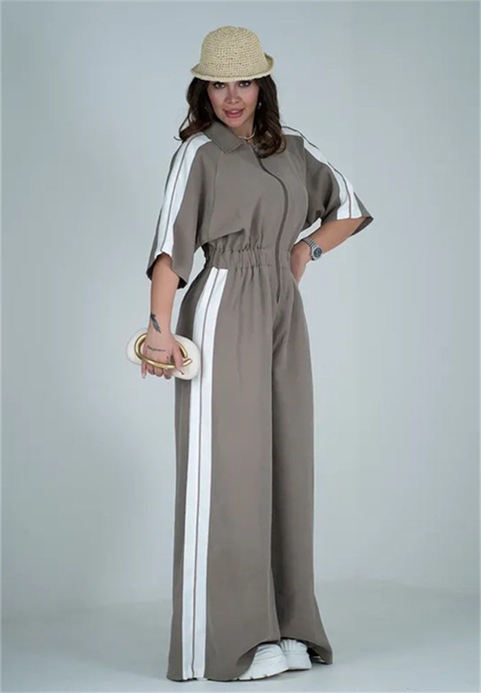 Kvinders lang jumpsuit med talje og kontraststriber