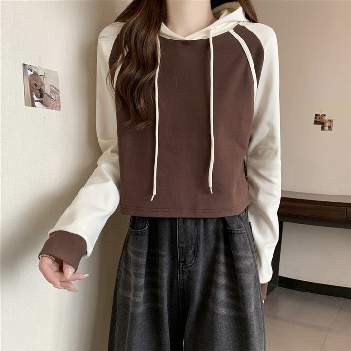 Femme Cropped Pullover Hoodie med kontrastærmer Stilla