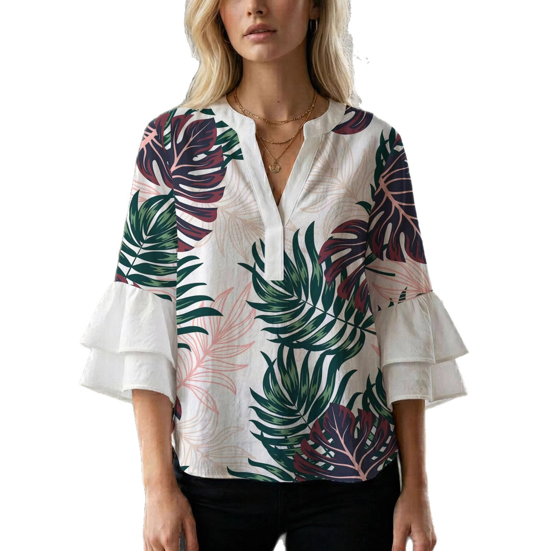 Dame bluse med voluminøse ærmer og kreativt trykdesign Skovae