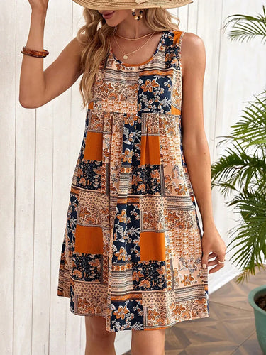 Dame ærmeløs sommerkjole med floralt patchwork-design Stilla