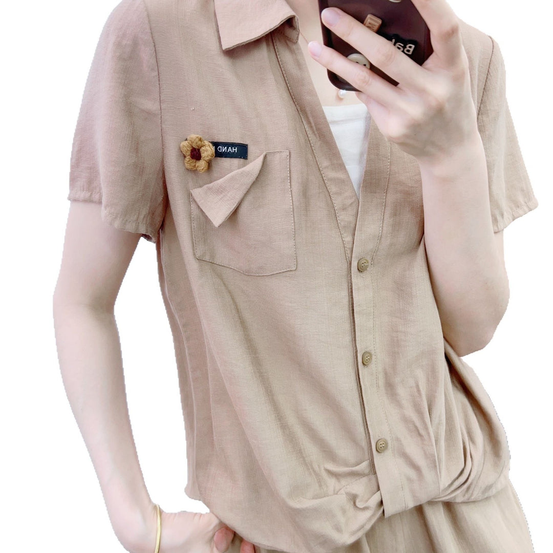 Dame afslappet jumpsuit med knapbart overdel og elegant taljebehandling Stilla