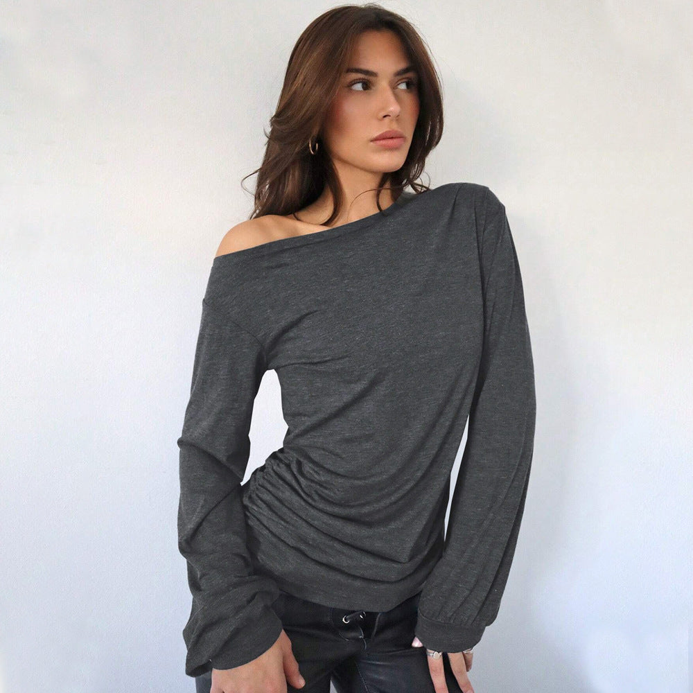 Kvinders afslappede off-shoulder langærmet skjorte med elegante flæsedetaljer Stilla