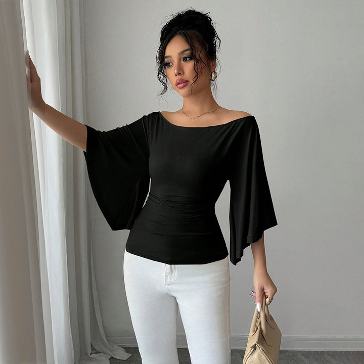 Kvinders elegante off-shoulder top med brede ærmer og tætsiddende pasform Stilla