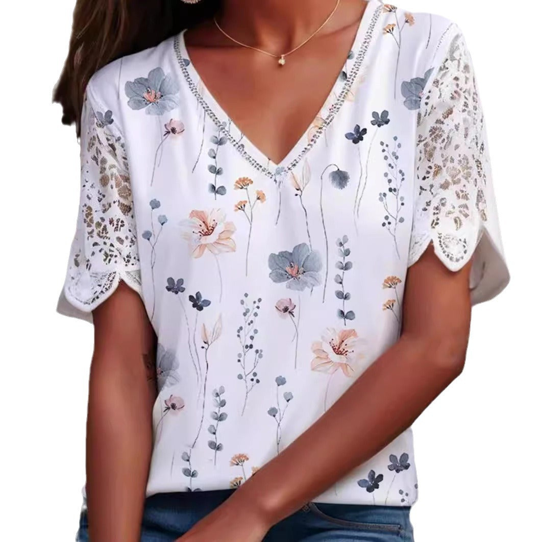 Damebluse med blomster-spidselement og elegant V-udskæring Stilla