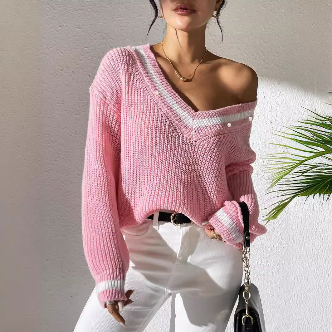 Dame oversized strikpullover med V-udskæring og elegante perledetaljer Stilla
