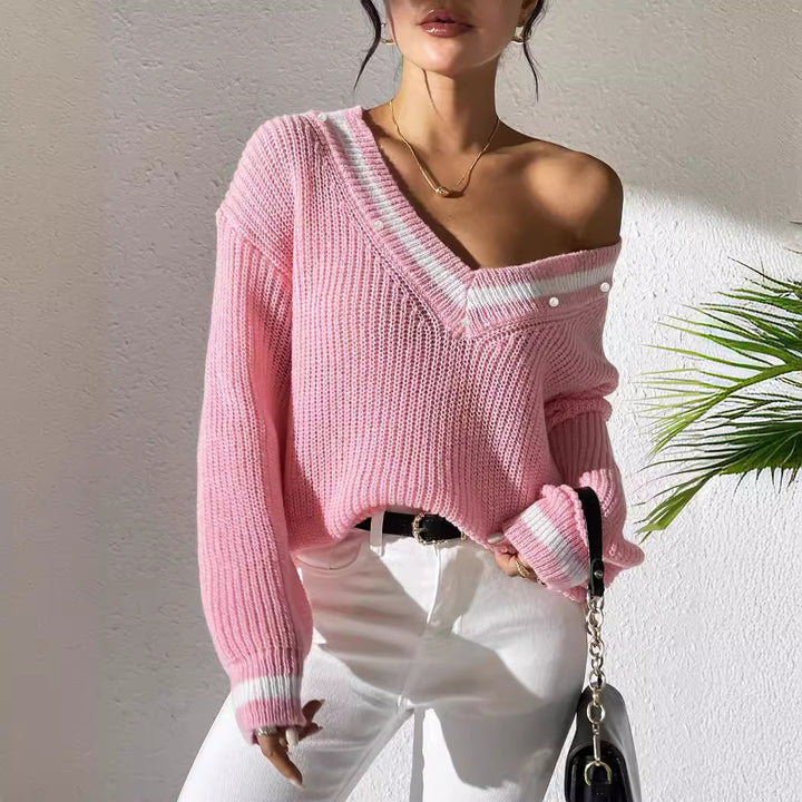 Dame oversized strikpullover med V-udskæring og elegante perledetaljer Stilla