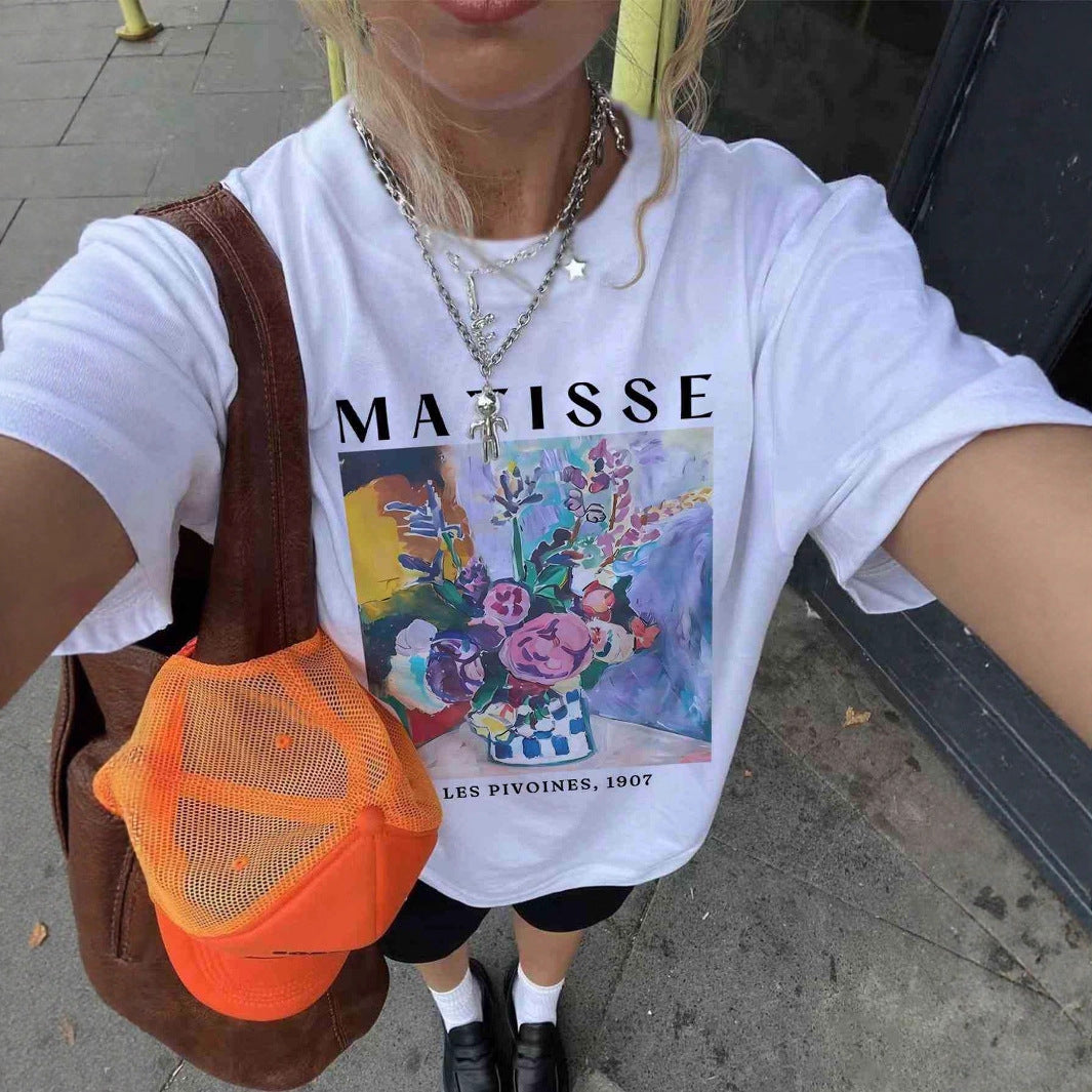 Dame T-shirt med kunstnerisk grafisk tryk og afslappet snit Skovae