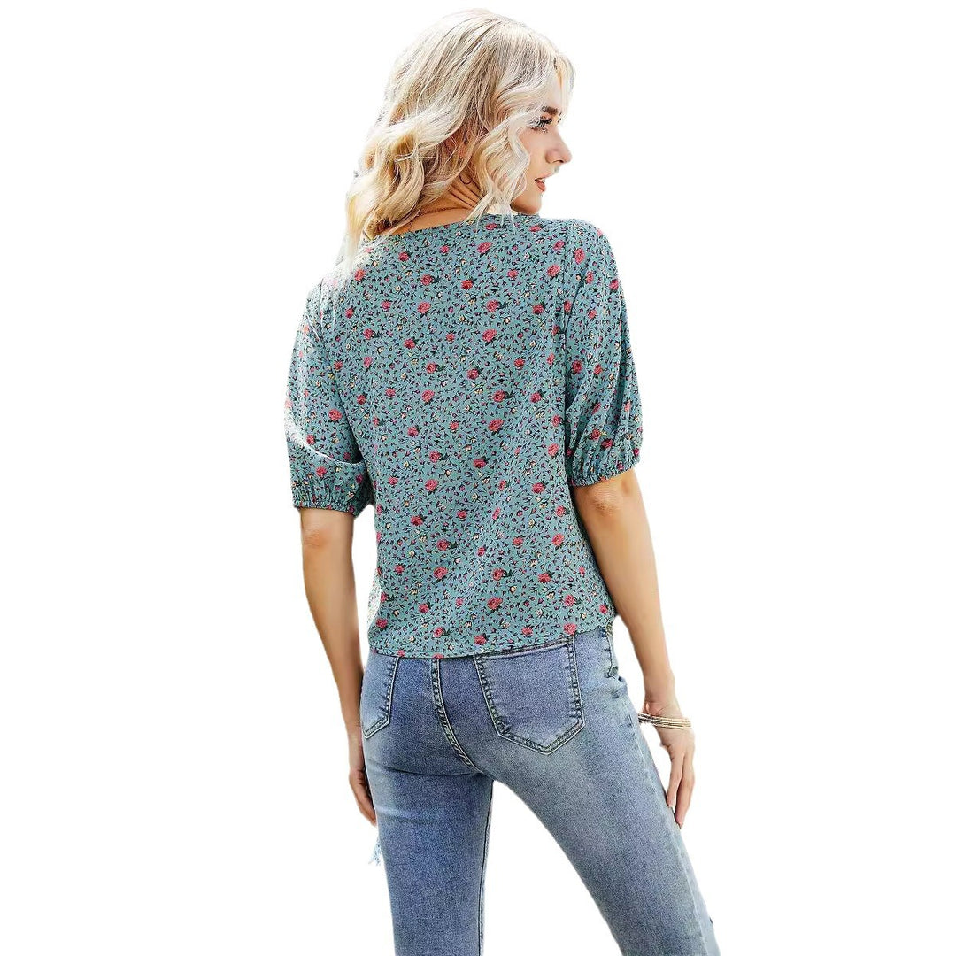 Dame indpakningsbluse med blomsterprint og tidløst design Stilla