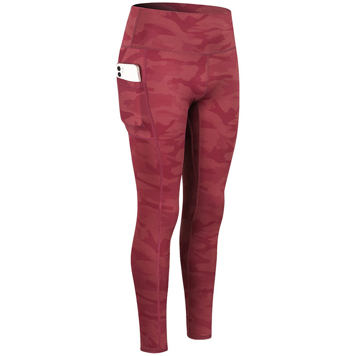 Dame Kvalitets Performance-Leggings med praktiske sidelommer og elastisk talje Stilla